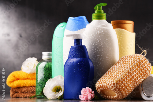 Plastic bottles of body care and beauty products photo