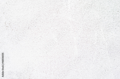 close up on white wall texture with unwanted detail on wall color.