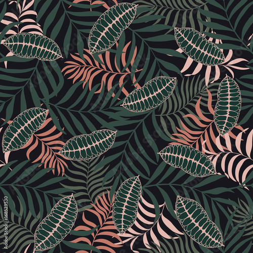 Tropical background with palm leaves. Seamless floral pattern