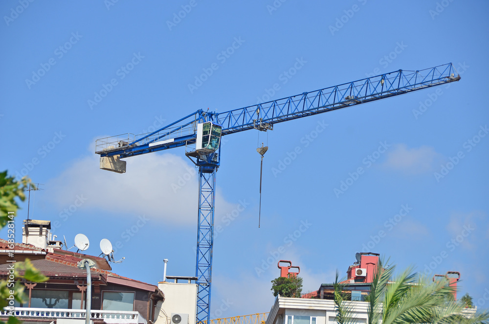 Crane near construction building in Istanbul city.