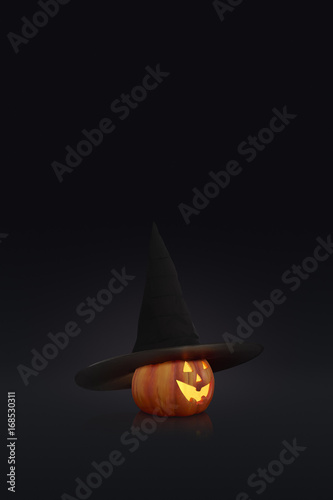 glowing pumpkin with witches hat halloween concept