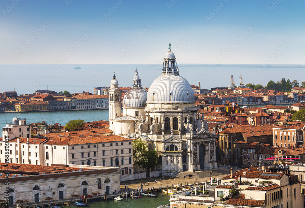 Panoramic view on Venice and the Basilica Santa Maria della Salute from the bell tower of St. Mark's Cathedral, Italy