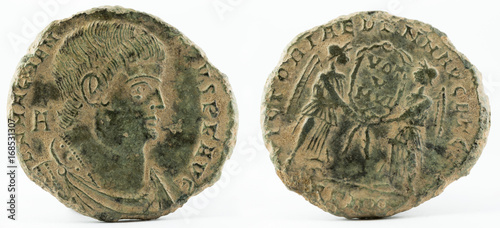 Ancient Roman copper coin of Emperor Magnentius. photo