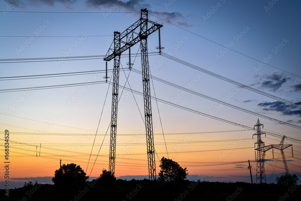 High voltage tower sky sunset background.