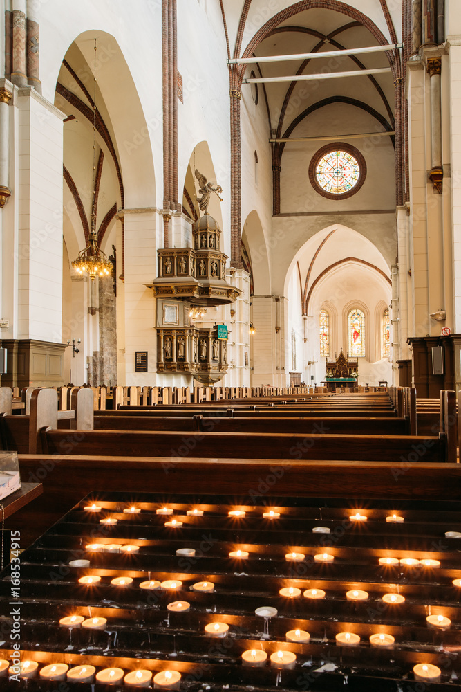 Fototapeta premium Riga, Latvia. Candles In The Riga Dom Dome Cathedral. Interior