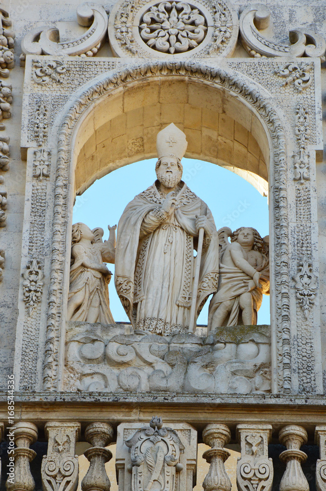 Fototapeta premium Detail of Sant'Oronzo statue on Lecce Cathedral, Apulia, Italy
