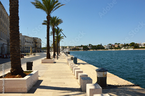 Blue water of seafront of Brindisi port  Apulia  Italy