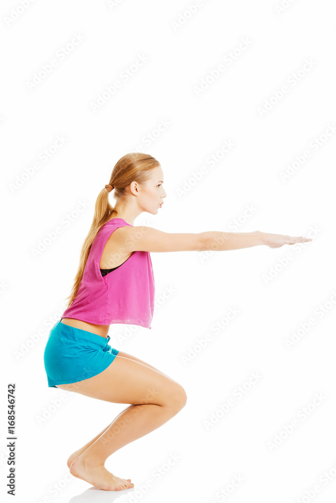 Young caucasian woman is doing exercises. Young caucasian woman is doing exercises.