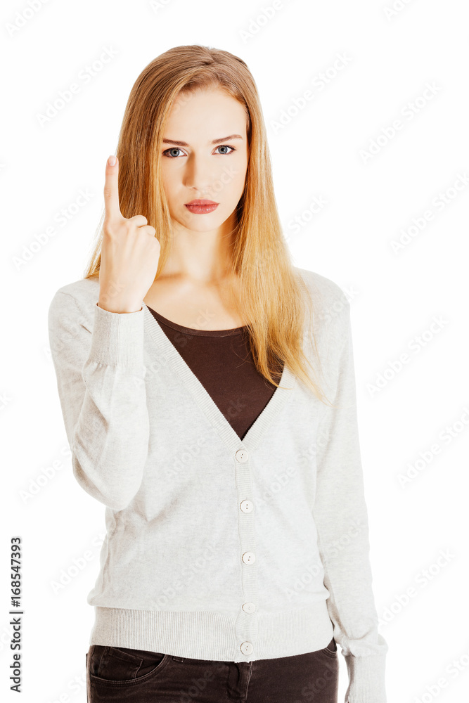 Beautiful woman is showing one finger in a warning. Beautiful woman is showing one finger in a warning.