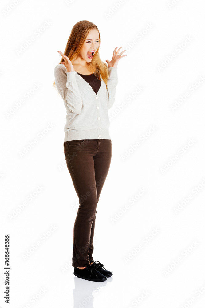 Beautiful positive and casual woman expressing surprise. Beautiful positive and casual woman expressing surprise.