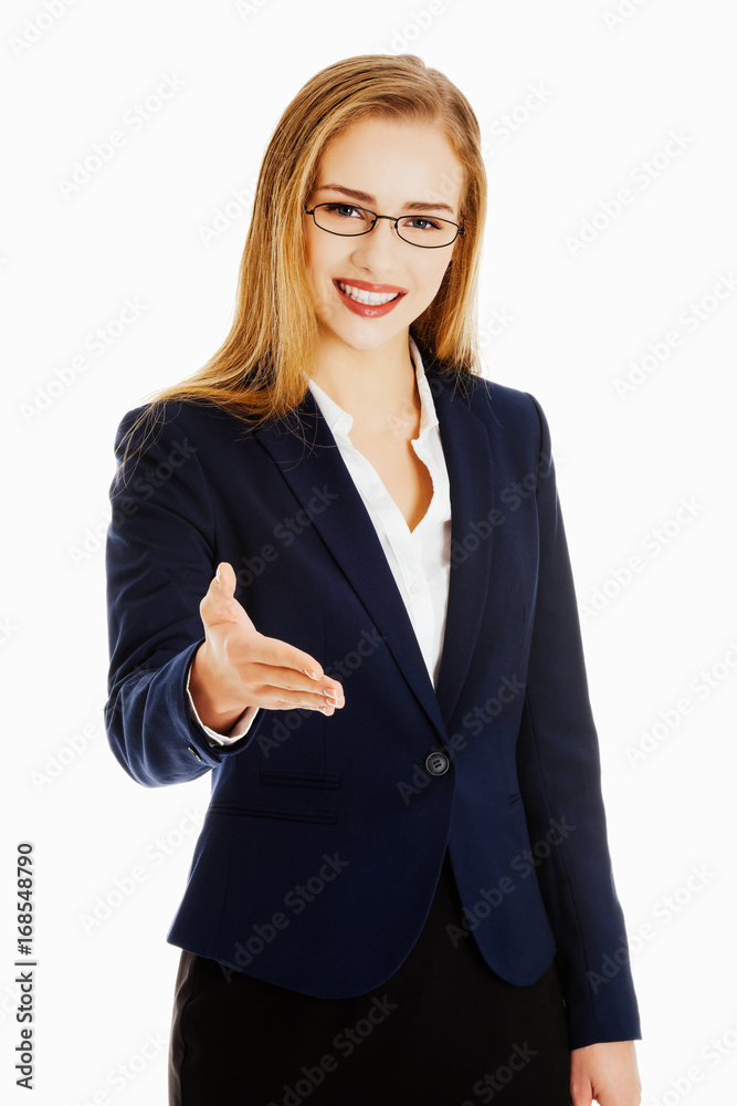 Beautiful caucasian business woman giving a hand. Beautiful caucasian business woman giving a hand.