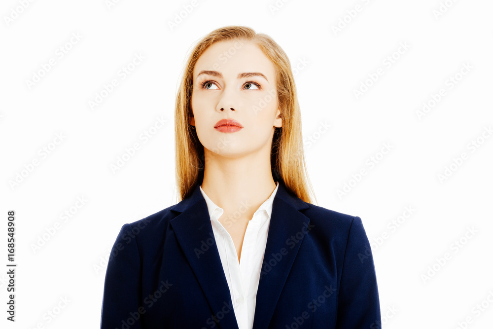 Beautiful business woman looking up at copy space. Beautiful business woman looking up at copy space.
