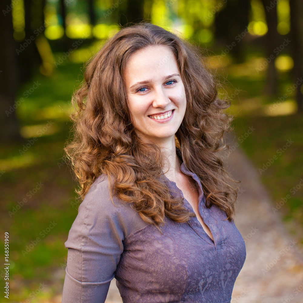 Fototapeta premium Portrait of beautiful young happy woman