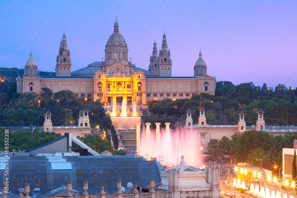 Aerial view of Dancing magic Fountain and National Art Museum on Placa Espanya in Barcelona at sunset, Catalonia, Spain