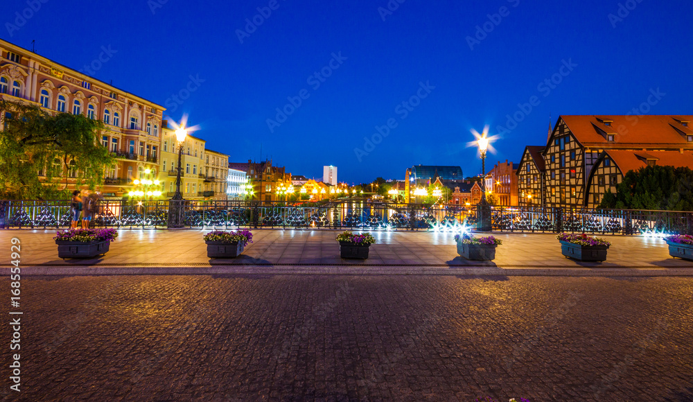 Old Town and granaries by the Brda River at night. Bydgoszcz. Poland