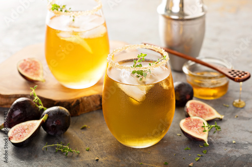 Fall refreshing cocktail with fig, honey and thyme