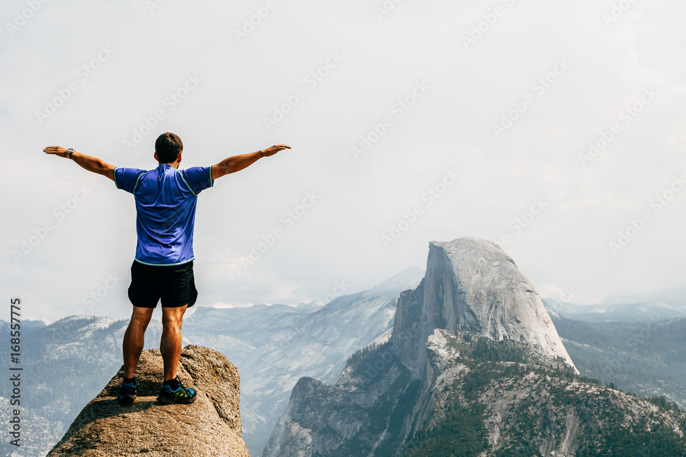 boy observing panoramic view of half dome boy observing panoramic view of half dome