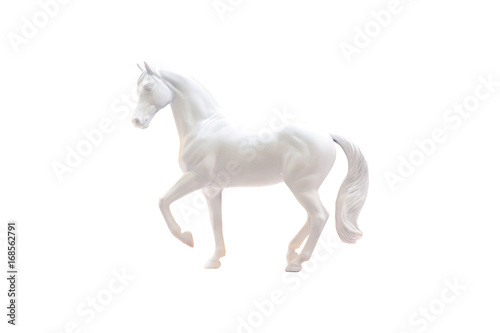 Naklejka Statuetka białego konia na białym tle.