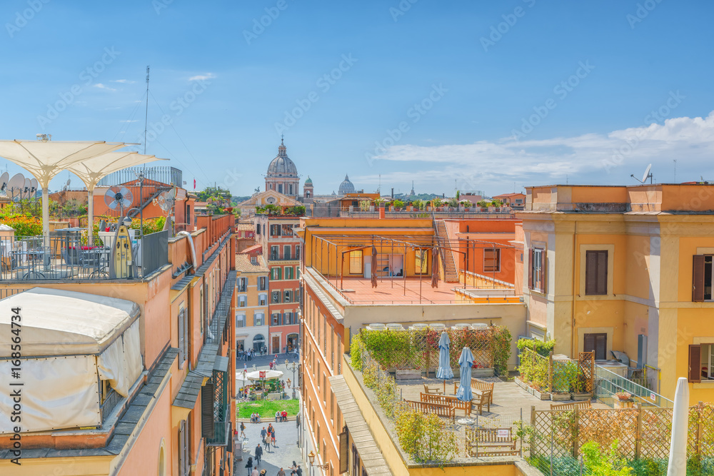 Beautiful landscape  urban and historical view of the Rome, street, people, tourists on it, urban life of the Eternal City above from Spanish Steps.Italy.
