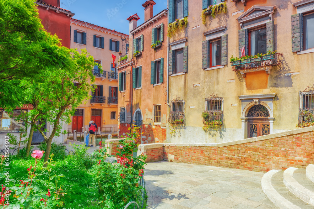  View of the most beautiful places of Venice, narrow streets, houses, city squares. Italy.