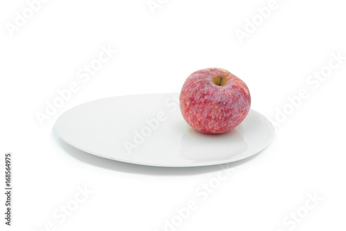 Ripe apple on a plate