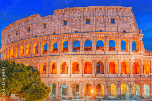 Beautiful landscape of the Colosseum in Rome- one of wonders of the world  in the evening time.