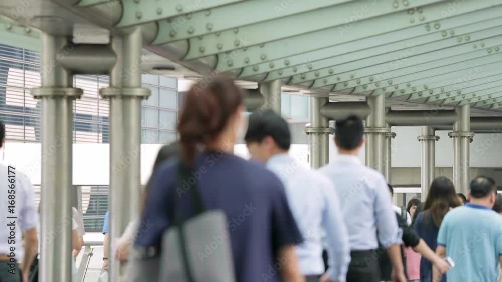 Central, Hong Kong, 10 May 2017 -: Slow motion of people walking in the bridge Central, Hong Kong, 10 May 2017 -: Slow motion of people walking in the bridge