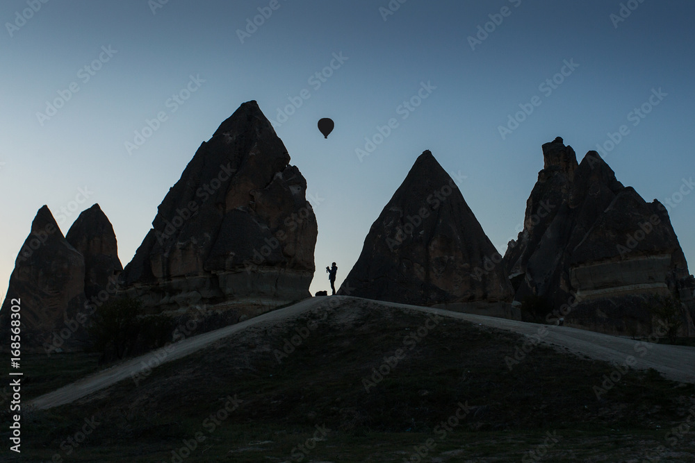 Naklejka premium Photographers taking pictures of balloons in Cappadocia, Turkey