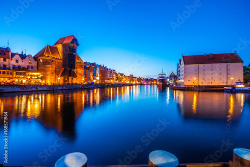 View of the old city of Gdansk and the Motlawa River at night. Poland
