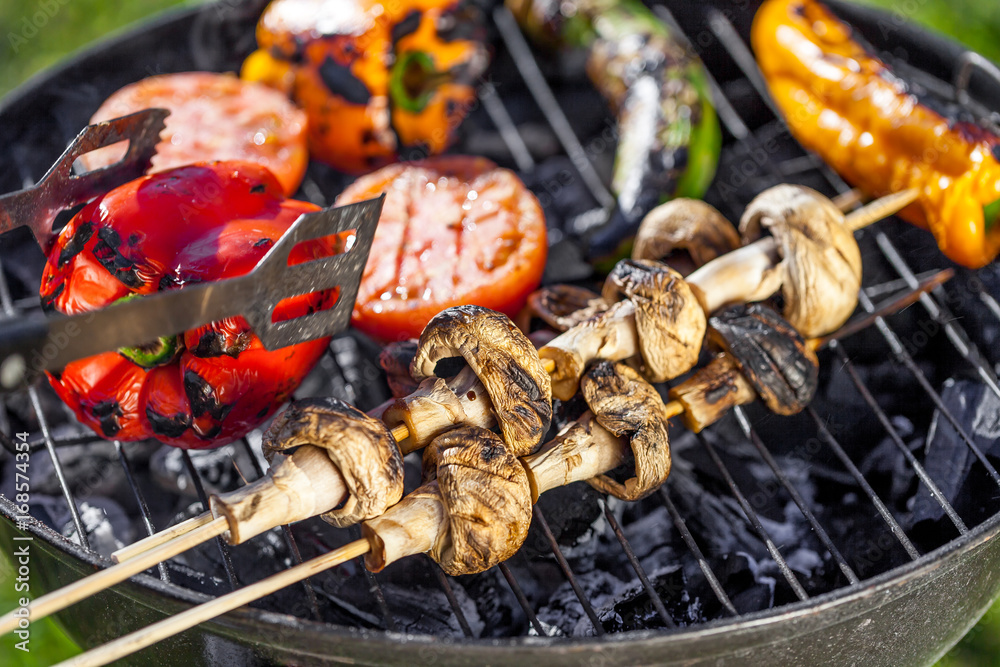 Foto Stock american barbecue - preparing bbq vegetables on charcoal grill |  Adobe Stock