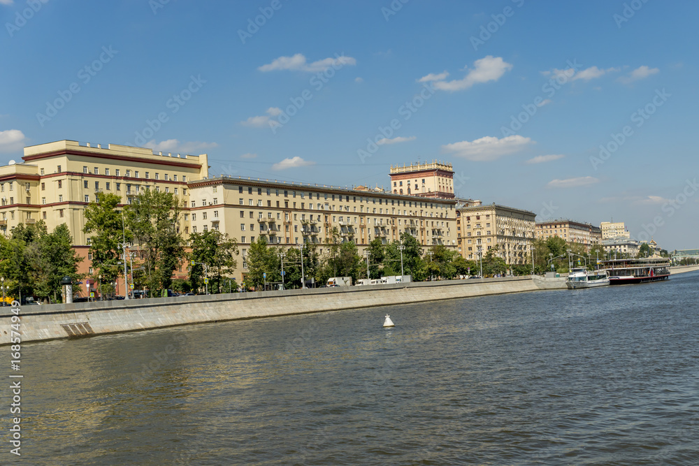 View of riverside of Moscow river and floating passenger boats