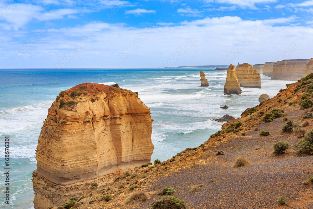 image of Very Big rock in the sea, Aerial view of Twelve Apostles rock formations and orange cliffs on the Great Ocean Road in the Port Campbell National Park Victoria, Australia