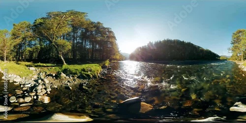4K 360 VR Virtual Reality of a river flows over rocks in this beautiful scene in the Altay mountains forest in autumn or summer end.