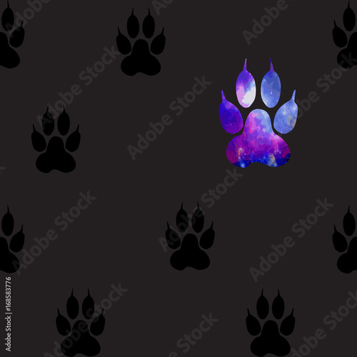 Seamless pattern with black paws on a gray background. Paw with a space pattern.