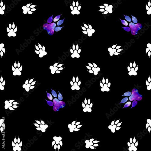 Seamless pattern with white paws on a black background. Paw with a space pattern.