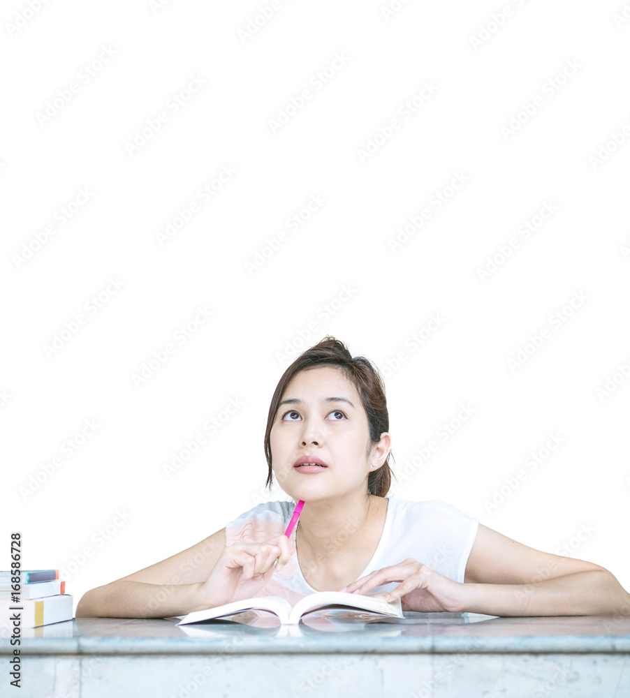 Closeup asian woman with thinking face with a book on marble table in front of house isolated on white background Closeup asian woman with thinking face with a book on marble table in front of house isolated on white background