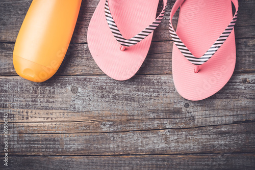 Summer accessories on an old wooden table