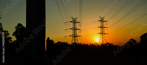 High voltage power tower at sunset in Brisbane, Queensland.
