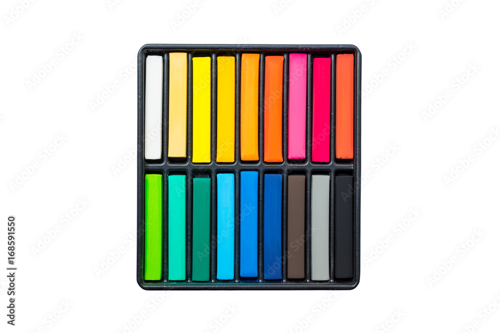 Set of colorful chalk stick on black tray Set of colorful chalk stick on black tray