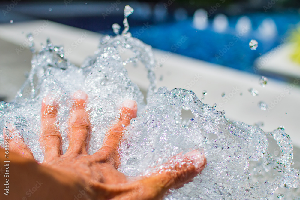 Fototapeta premium Hand with water splash