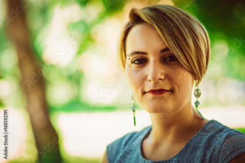 Young beautiful girl with short haircut photo