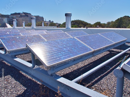 Solar panels or Solar cells on rooftop or terrace of building in Cape Town, South Africa. Can saving energy. Green or Sun or renewable or Clean energy.