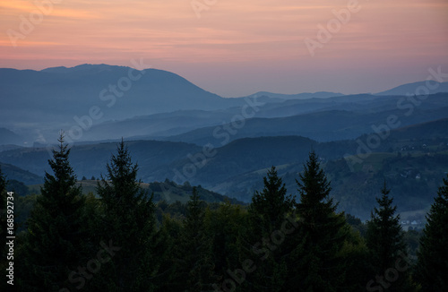 reddish sky at dawn in mountains