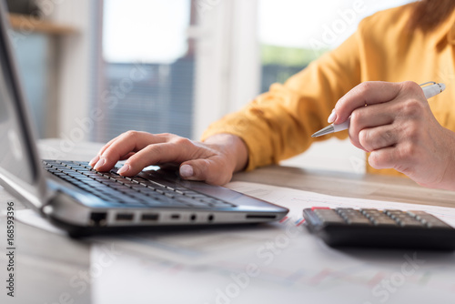 Accountant working on laptop