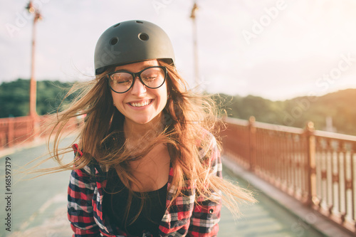 Woman is an extreme sport helmet photo