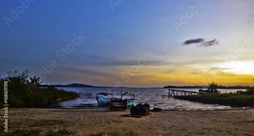 Fishing boat landing site on Lake Victoria at sunset