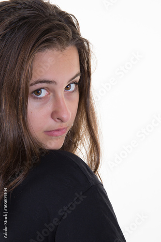 Beautiful young woman posing on white background