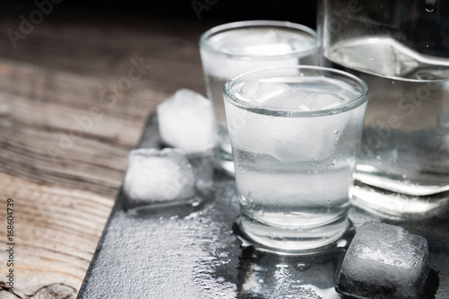 Vodka with ice in shot glasses