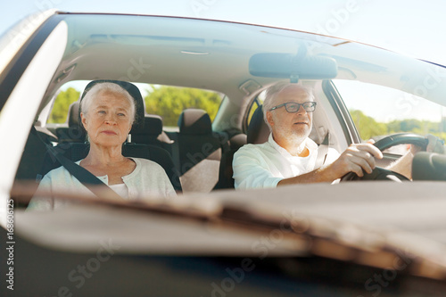 happy senior couple driving in car © Syda Productions