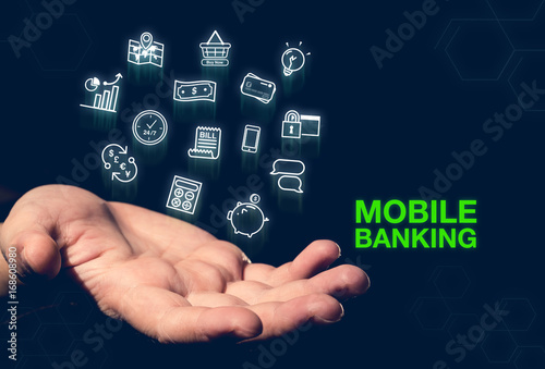 Mobile banking glowing icon floating over open hand on dark blue background,online payment,Digital Lifestyle concept.